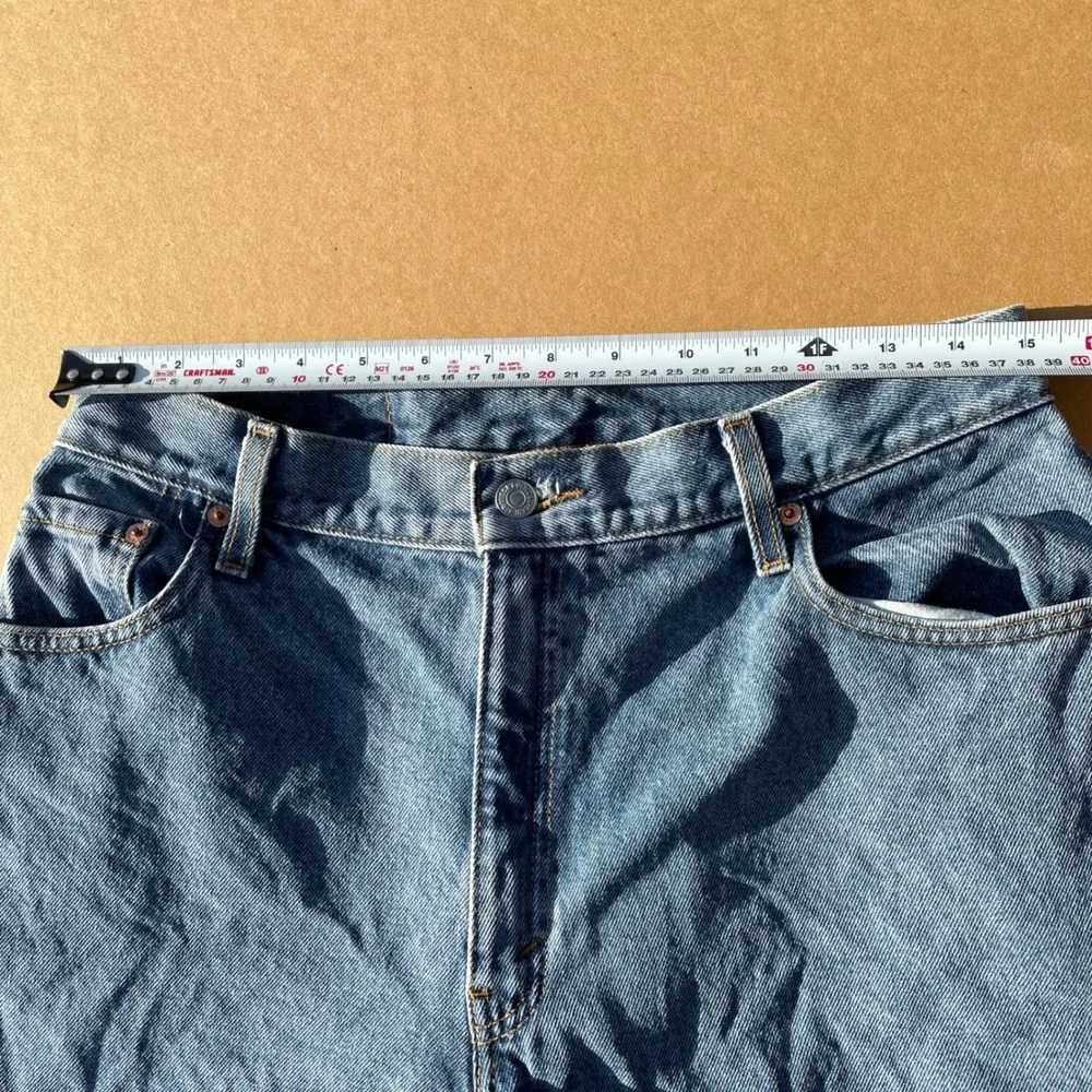 Vintage Levi's 550 Relaxed Tapered Jeans Women 14 Blue Casual High Rise Denim 90